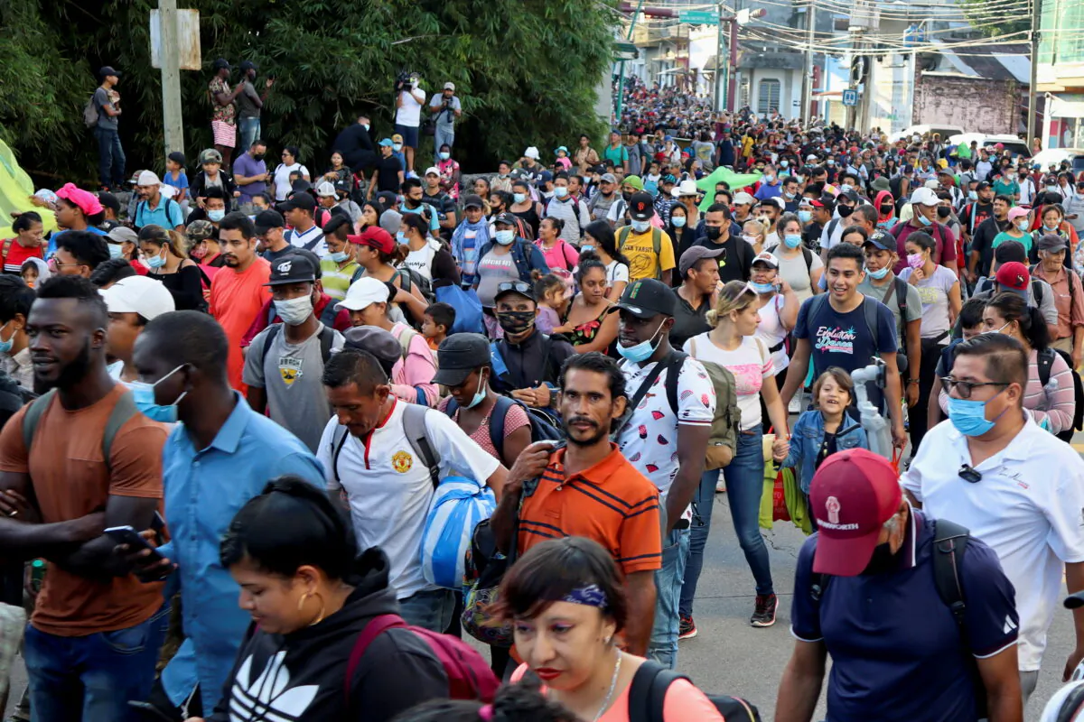 A caravan consisting of migrants from Central America and Haiti make their way through Tapachula, in Chiapas state, Mexico, on Oct. 23, 2021. (Jose Torres/Reuters)