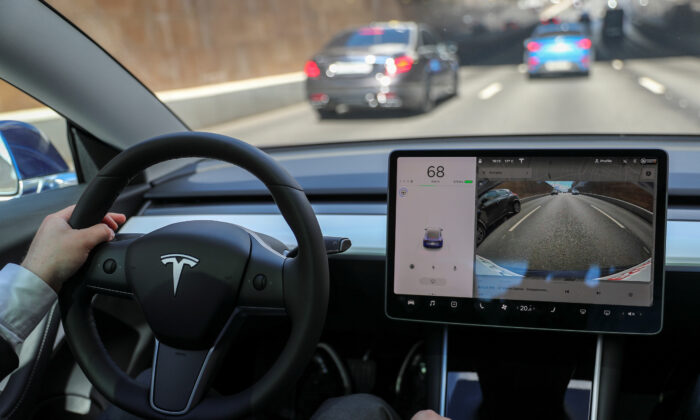 The interior of a Tesla Model 3 electric vehicle is shown in this picture illustration taken in Moscow, Russia, on July 23, 2020. (Evgenia Novozhenina/Reuters)