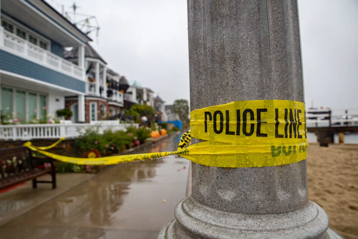 Newport Beach Police and HAZMAT Units investigate three deaths and one injury at a Balboa Island Home in Newport Beach, Calif., on Oct. 25, 2021. (John Fredricks/The Epoch Times)