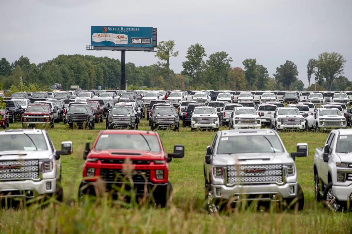 Chevrolet Silverados and GMC Sierra pickups built at Flint Assembly in Flint, Michigan, on Sept. 21, 2021. (Jake May/AP Photo)