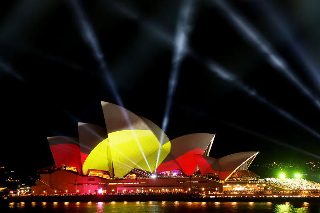 The Aboriginal flag is seen projected on the sails of the Sydney Opera House in Sydney, Australia, on Jan. 26, 2020. (Don Arnold/Getty Images)