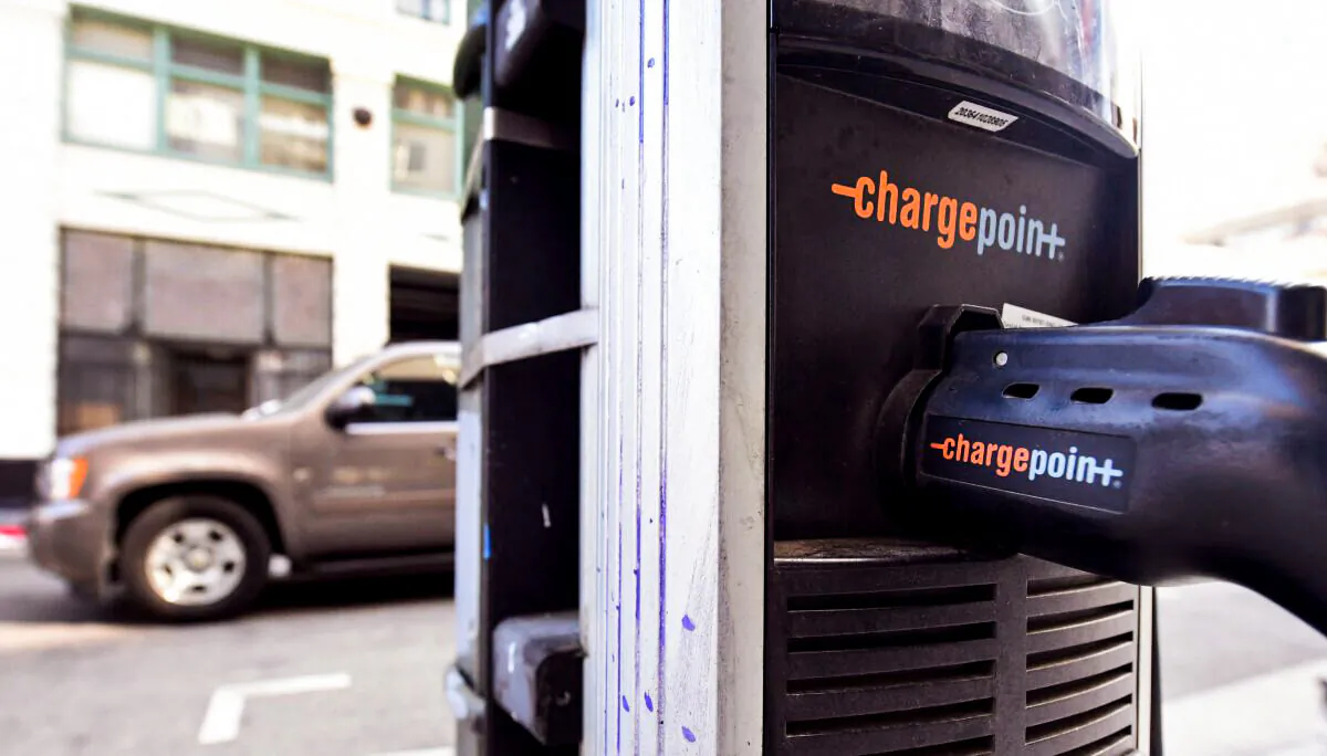 An Electric Vehicle charging station in seen downtown Los Angeles, California on May 18, 2021. - President Joe Biden's administration continues the push for alternative forms of transportation and energy and on a visit today to the Ford Motor plant in Dearborn, Michigan, Biden made the case for his $174 billion electric-vehicle proposal, urging automakers not to build zero-emission vehicles abroad for US consumers and touting electric vehicles as the future of the auto industry. (Photo by Frederic J. BROWN / AFP) (Photo by FREDERIC J. BROWN/AFP via Getty Images)