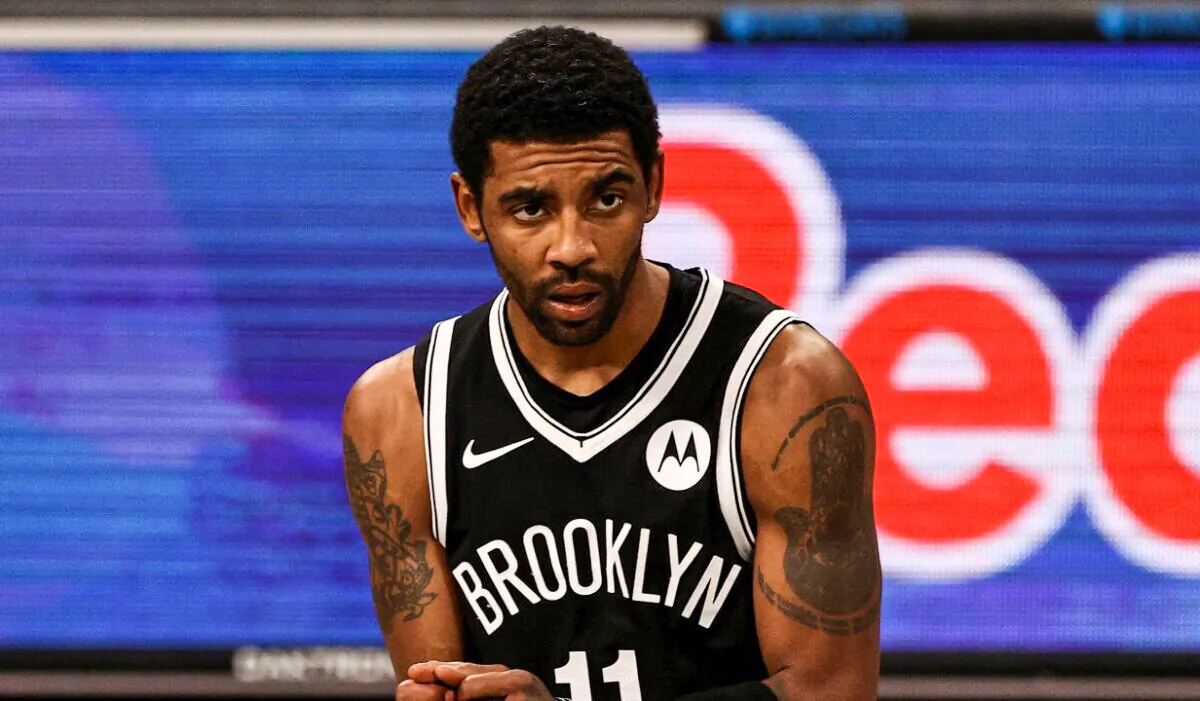 Kyrie Irving #11 of the Brooklyn Nets reacts in the second half against the Miami Heat at Barclays Center in New York City on Jan. 23, 2021. (Elsa/Getty Images)