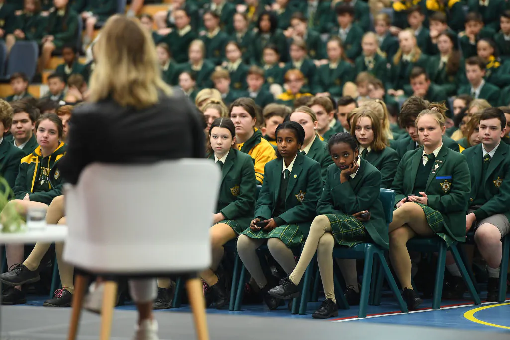 Australian Swimmer Ariarne Titmus talks to students at St Patricks College in Launceston, Australia, on Sept. 15, 2021. (Steve Bell/Getty Images for TLA)