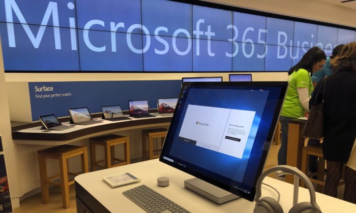 A Microsoft computer is among items displayed at a Microsoft store in suburban Boston, on Jan. 28, 2020. (Steven Senne/AP Photo)