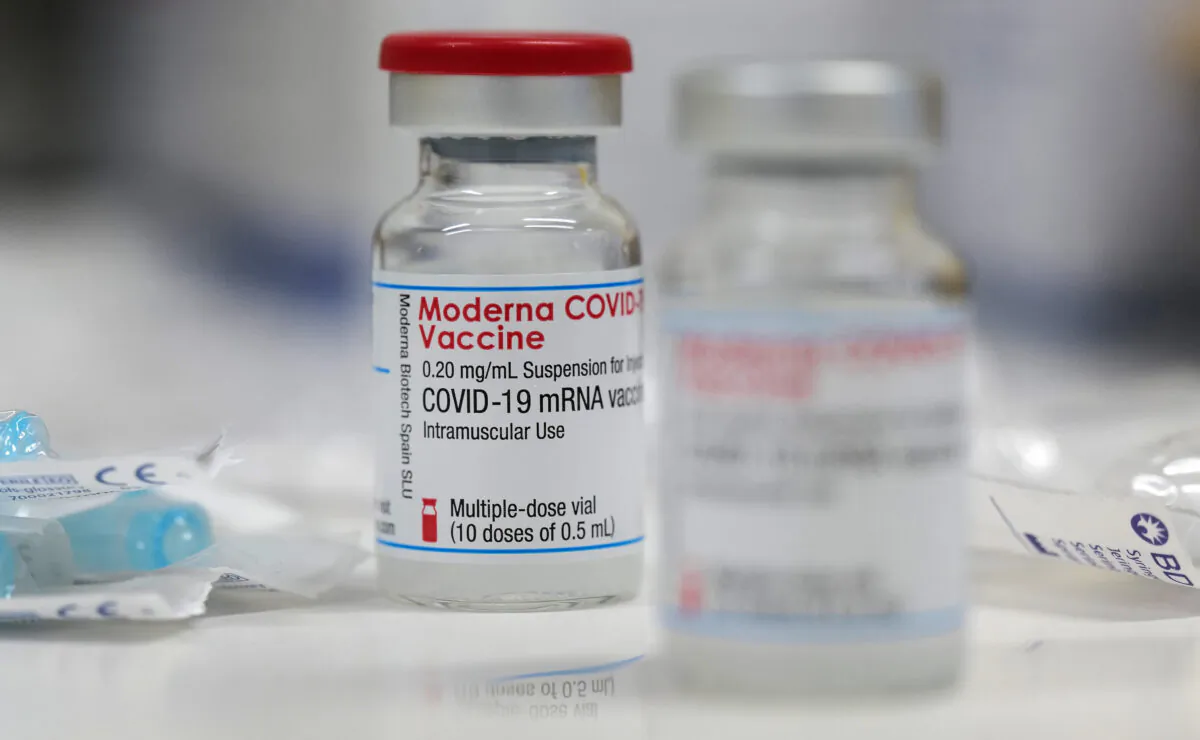 A vial of the Moderna COVID-19 vaccine is seen at a local clinic in Aschaffenburg, Germany, on Jan. 15, 2021. (Kai Pfaffenbach/Reuters)