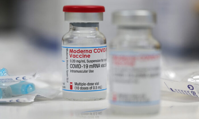 A vial of the Moderna COVID-19 vaccine is seen at a local clinic in Aschaffenburg, Germany, on Jan. 15, 2021. (Kai Pfaffenbach/Reuters)