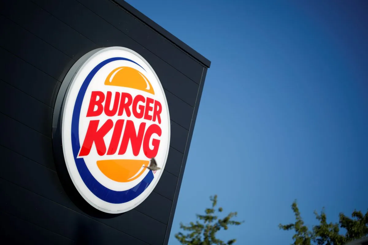 The Burger King company logo stands on a sign outside a restaurant in Bretigny-sur-Orge, near Paris, France on July 30, 2020. (Benoit Tessier/Reuters)