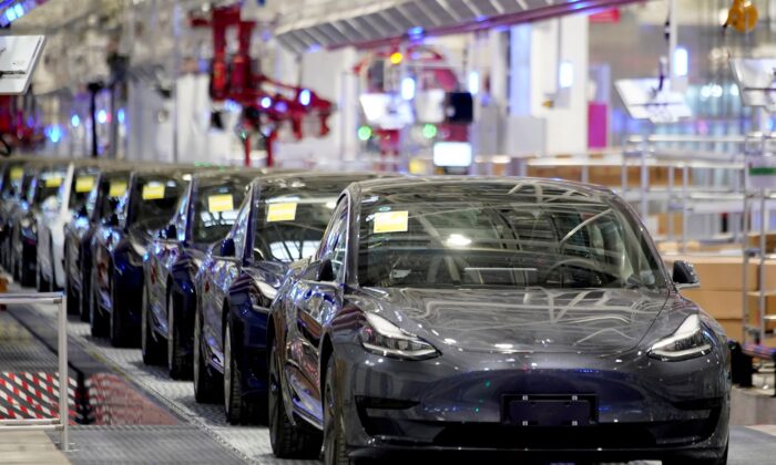 The Tesla China-made Model 3 vehicle will be seen during a delivery event at its factory in Shanghai, China, on January 7, 2020.  (AlySong / Reuters)