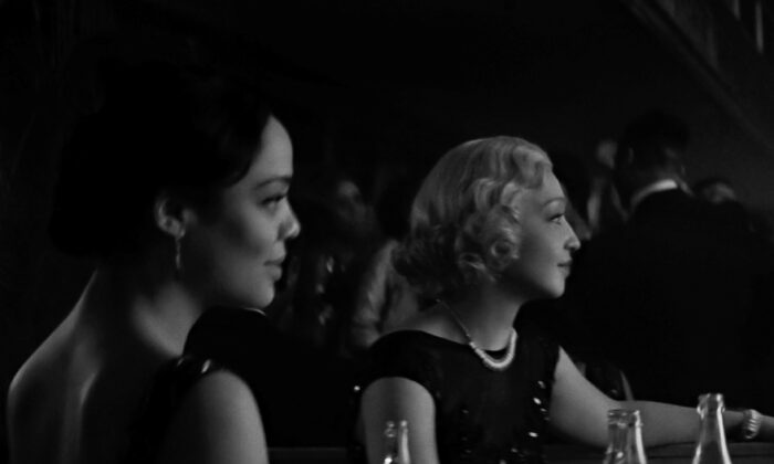 Irene (Tess Thompson, L) and Clare (Ruth Negga), once high school friends, have chosen very different paths in life, in “Passing.” (Netflix)