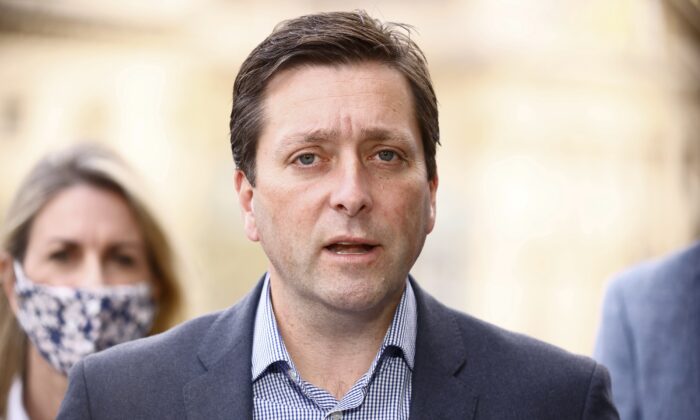 Leader of the Opposition Matthew Guy addresses the media during a press conference on the steps of Parliament in Melbourne, Australia, on Sept. 12, 2021. (AAP Image/Daniel Pockett) 