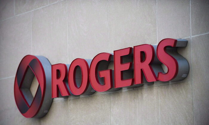 The Rogers Communications Inc. sign at the company's headquarters in Toronto on April 25, 2012. (The Canadian Press/Aaron Vincent Elkaim)