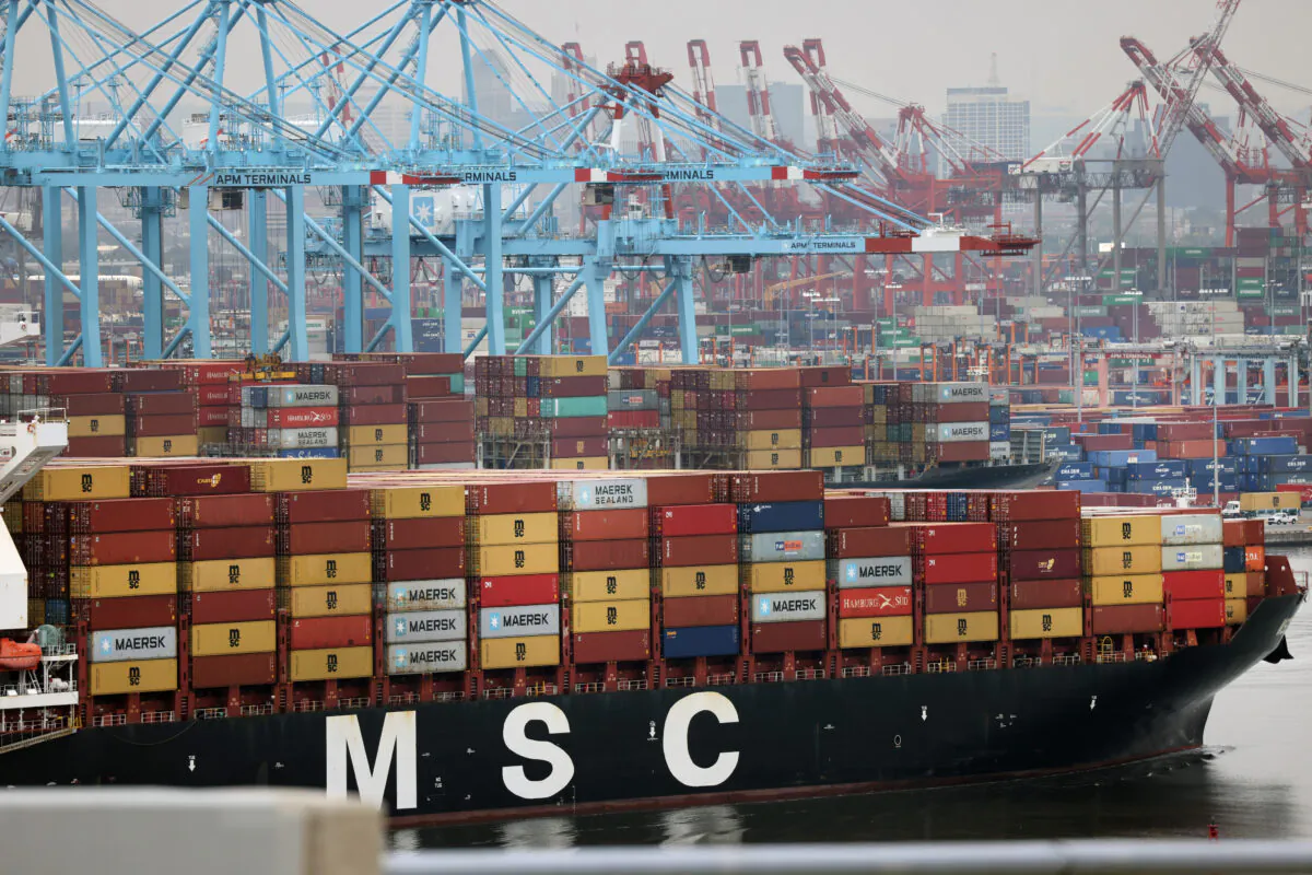 A cargo ship moves towards the Bayonne Bridge as it heads into port on October 13, 2021 in Bayonne, New Jersey. (Spencer Platt/Getty Images)
