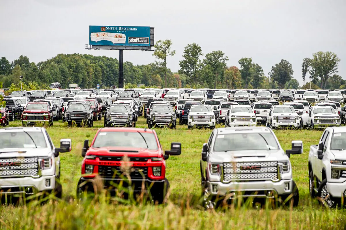 The Chevrolet Silverados and GMC Sierra pickups built at Flint Assembly are packed, on Sept. 21, 2021. (Jake May/ AP Photo)