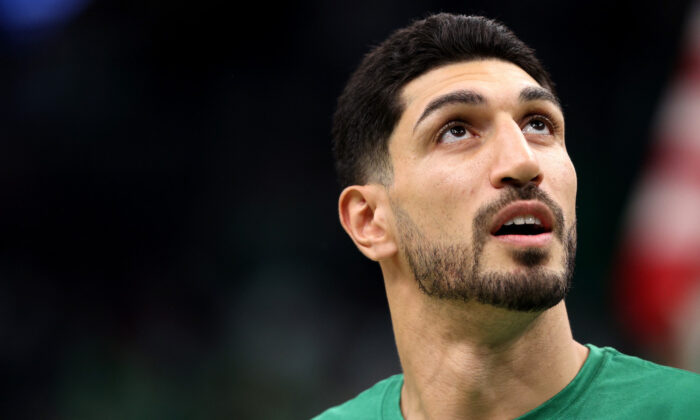 Enes Kanter Freedom of the Boston Celtics looks on before during the Celtics home opener against the Toronto Raptors at TD Garden in Boston on Oct. 22, 2021. (Maddie Meyer/Getty Images)