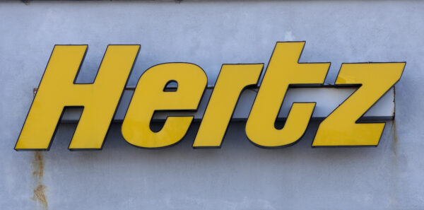 A Hertz rental car logo