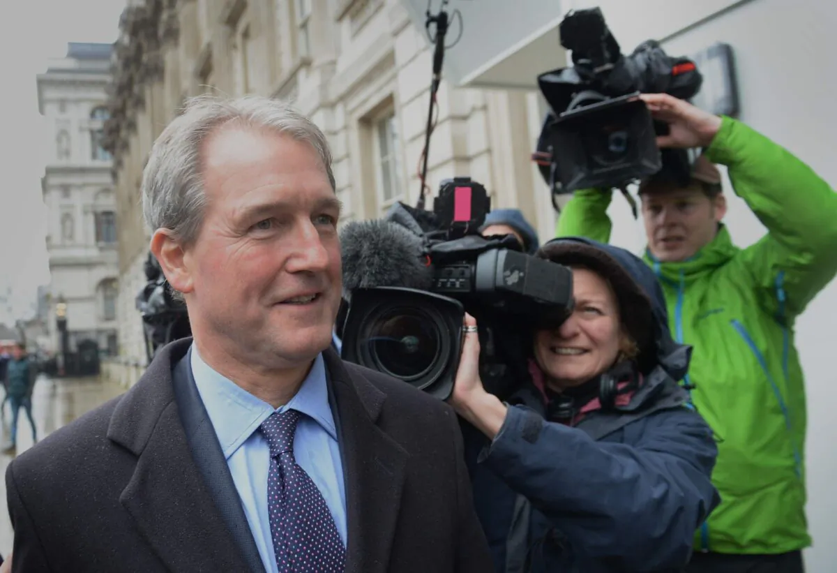 Owen Paterson with reporters after a parliamentary standards watchdog found said he had broken rules on lobbying, on Oct. 26, 2021. (Stefan Rousseau/PA)
