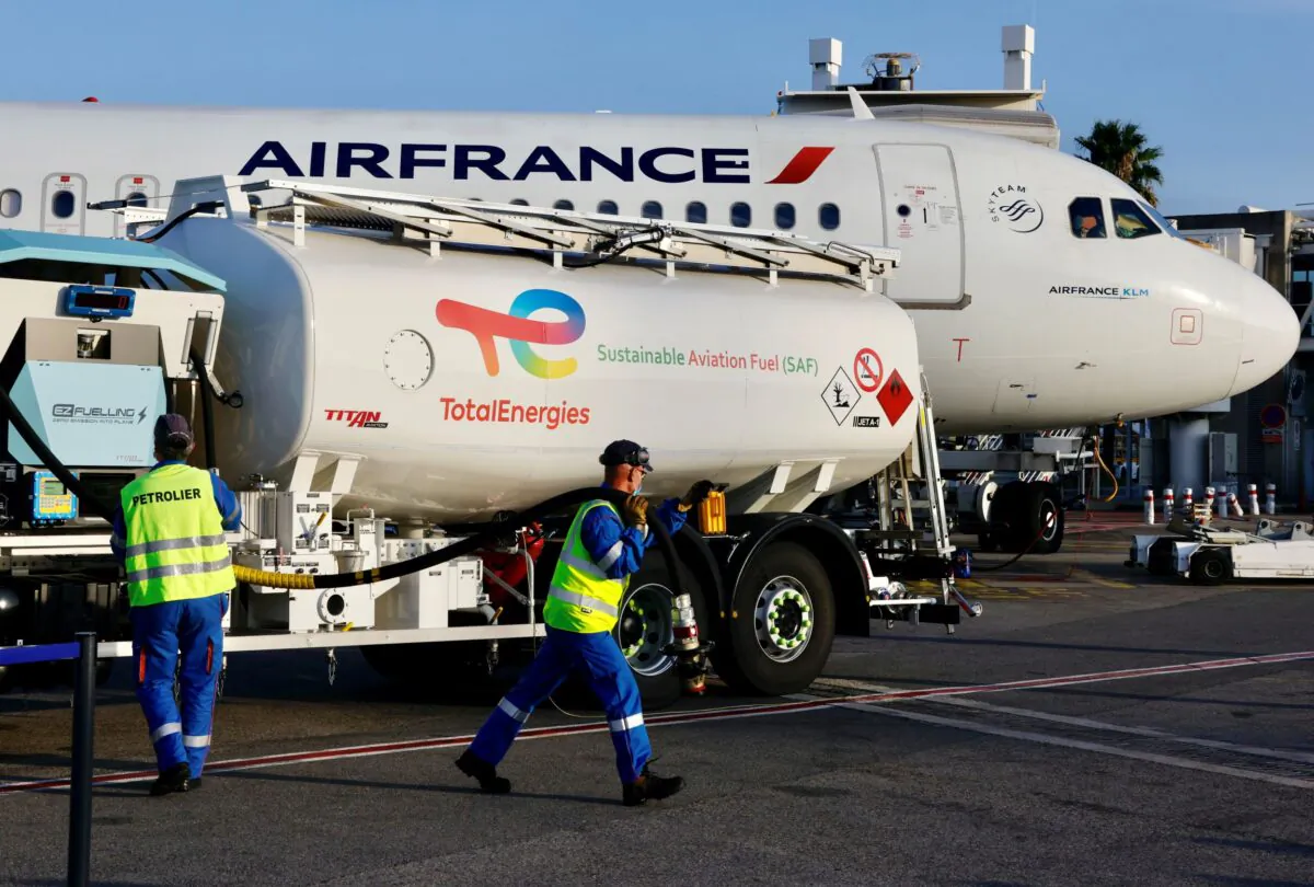 An Air France aircraft, operated with sustainable aviation fuel (SAF) produced by TotalEnergies, is refueled before its first flight from Nice to Paris at Nice airport, France on Oct. 1, 2021. (Eric Gaillard/Reuters)
