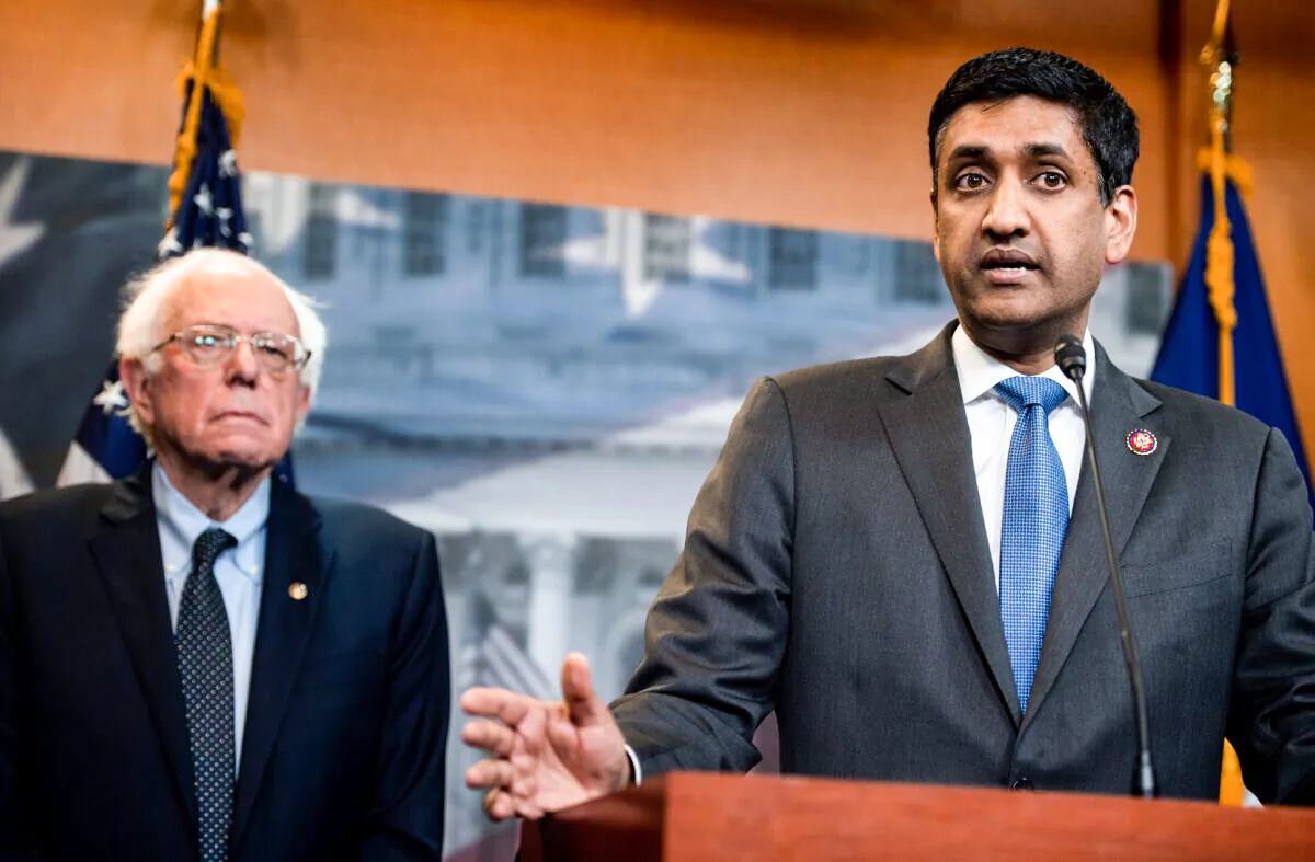 Rep. Ro Khanna (D-Calif.), right, and Sen. Bernie Sanders (I-Vt.) at a press conference in Washington in an April 2019 file photograph. (Saul Loeb/AFP via Getty Images)