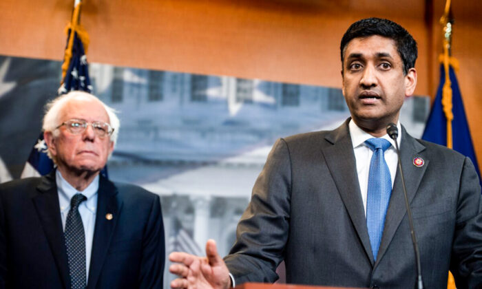 Rep. Ro Khanna (D-Calif.), right, and Sen. Bernie Sanders (I-Vt.) at a press conference in Washington in an April 2019 file photograph. (Saul Loeb/AFP via Getty Images)