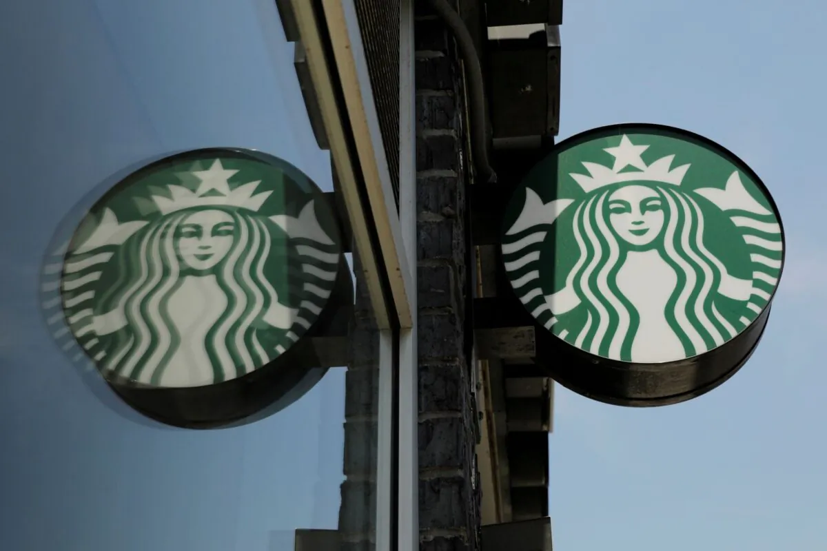 A Starbucks logo hangs outside of the Starbucks store in the Brooklyn borough of New York on May 29, 2018. (Lucas Jackson/Reuters)