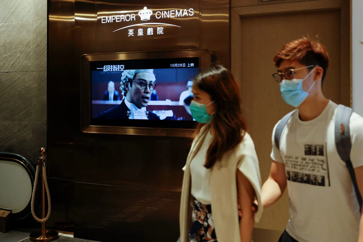 The trailer of Hong Kong movie 'The Attorney' is seen outside a cinema, in Hong Kong, on Oct. 27, 2021. (Tyrone Siu/Reuters)