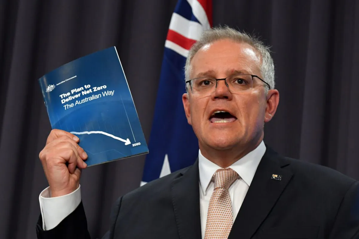 Prime Minister Scott Morrison speaks to the media during a press conference at Parliament House in Canberra, Australia, on Oct. 26, 2021. (AAP Image/Mick Tsikas)