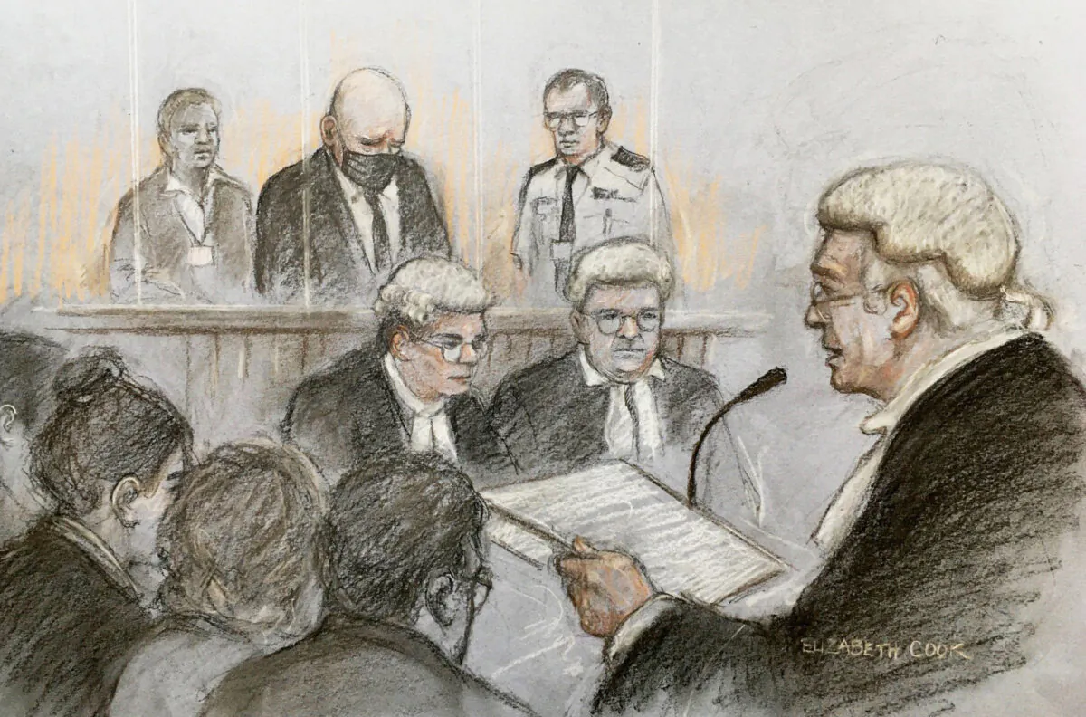 Court artist sketch of Lord Justice Fulford sentencing former police officer Wayne Couzens at the Old Bailey in London. on Sept. 30, 2021. ((Elizabeth Cook/PA)