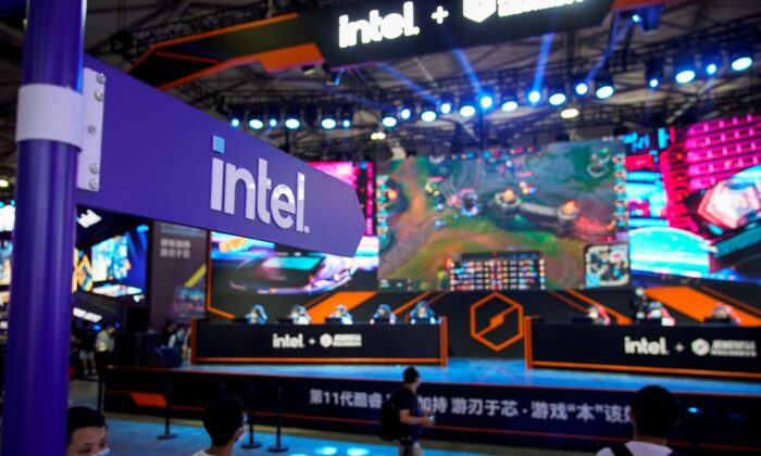 Visitors are seen at the Intel booth during the China Digital Entertainment Expo and Conference, also known as ChinaJoy, in Shanghai, China, on July 30, 2021. (Aly Song/Reuters)