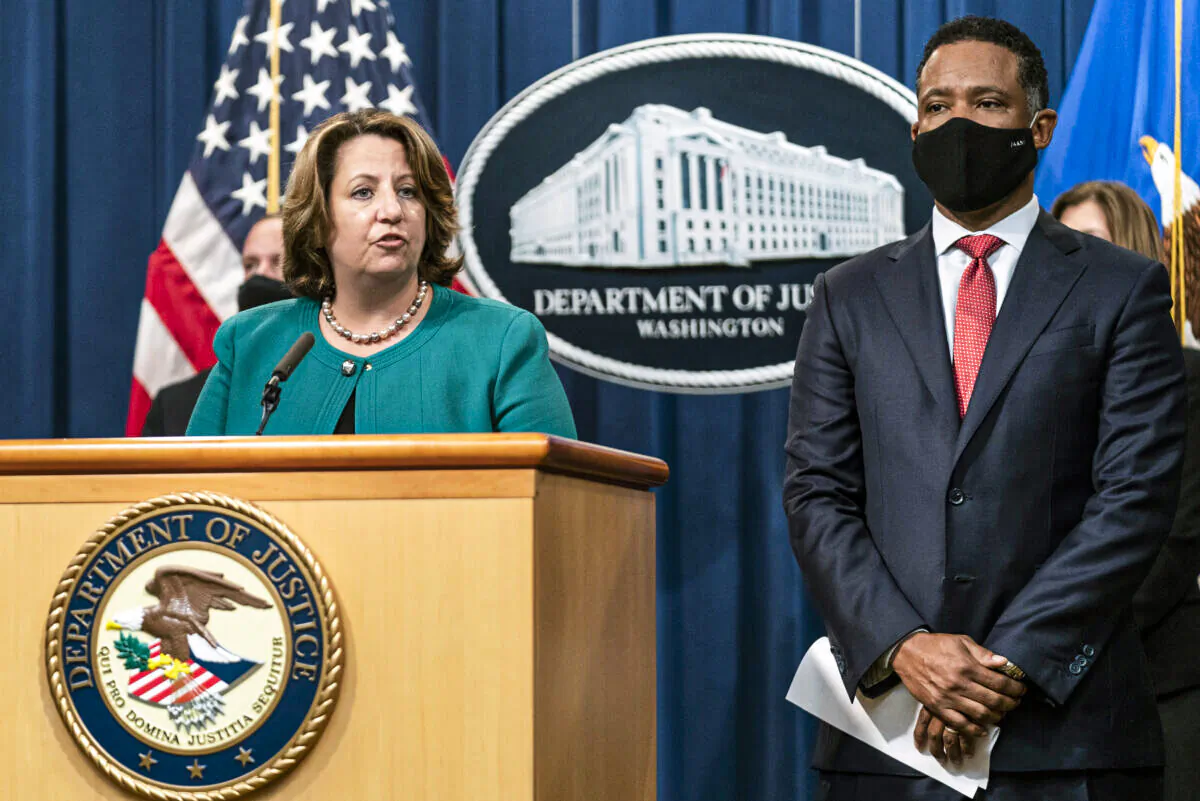 Deputy Attorney General Lisa Monaco, with Assistant Attorney General Kenneth Polite Jr. of the Justice Department's Criminal Division, speaks during a news at the Department of Justice in Washington on Oct. 26, 2021. (Manuel Balce Ceneta/AP Photo)