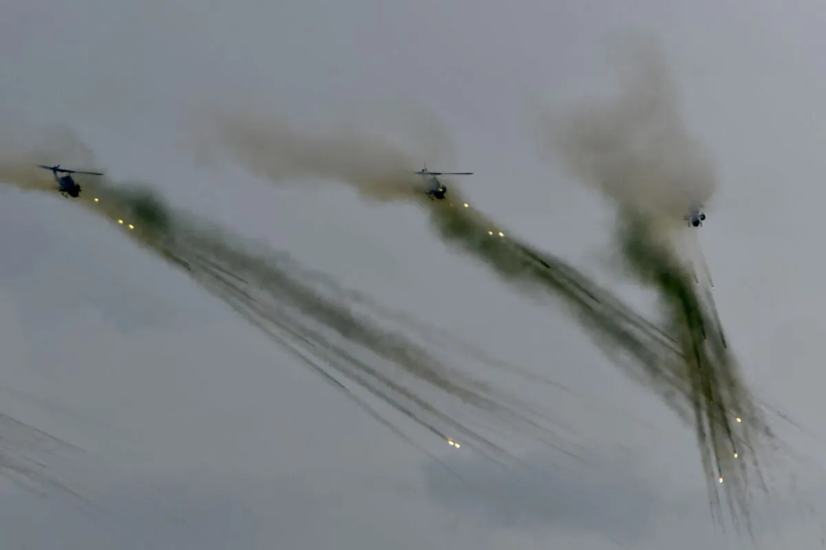 Three US-made AH-1W Super Cobra attack helicopters take part in the annual Han Kuang military drills in Taichung on July 16, 2020. (Sam Yeh/AFP via Getty Images)