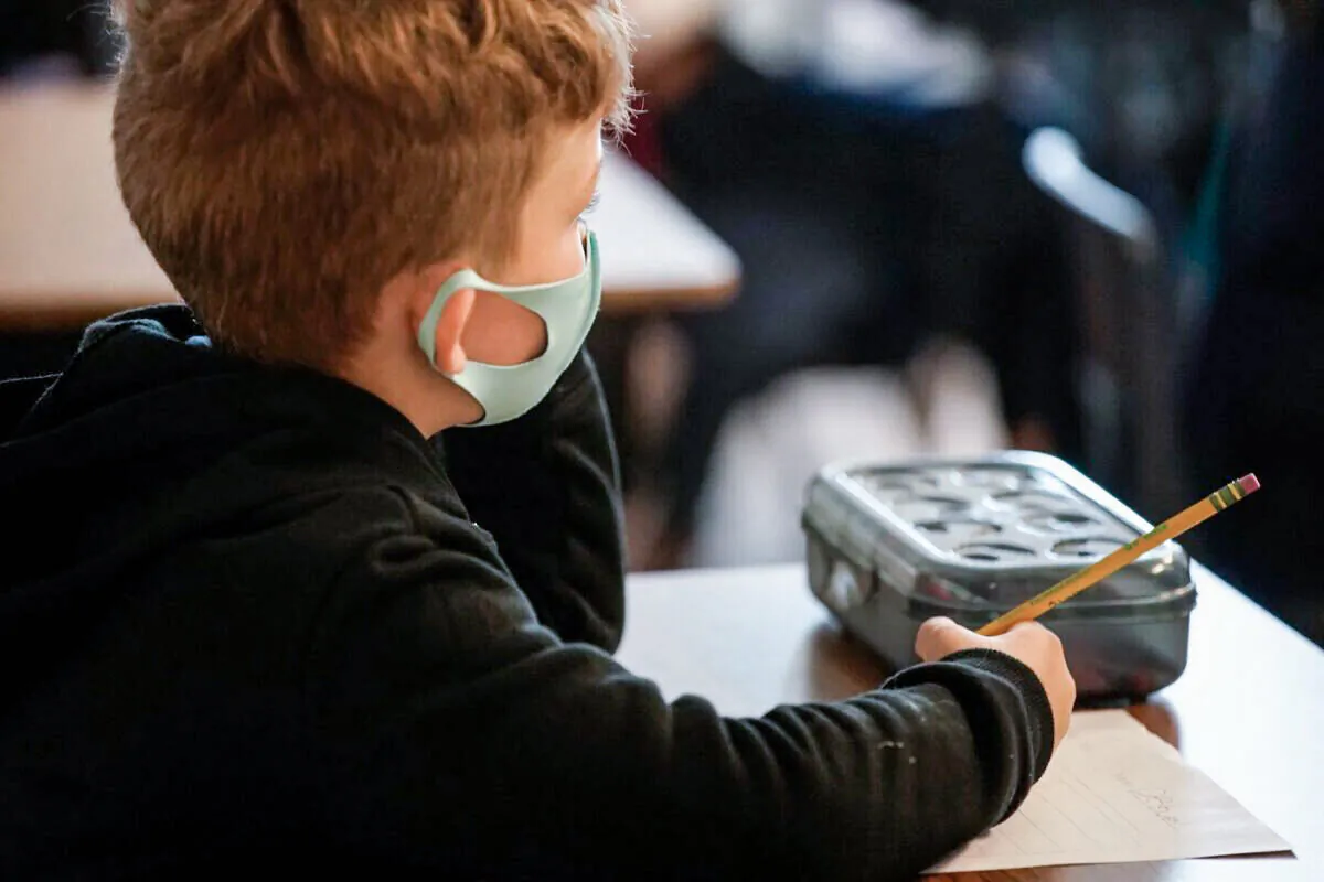 A masked student attending class at a U.S. school on Sept. 10, 2020. (George Frey/AFP via Getty Images)