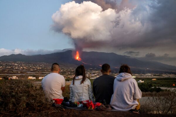 Residents watch as lava flows