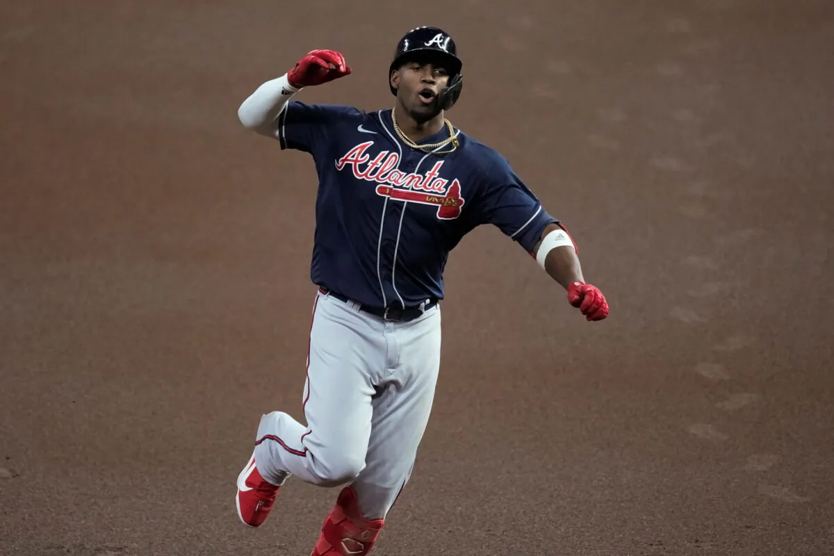 Atlanta Braves' Jorge Soler celebrates his home run during the first inning of Game 1 in baseball's World Series between the Houston Astros and the Atlanta Braves, in Houston, Texas, on Oct. 26, 2021. (Eric Gay/AP Photo)