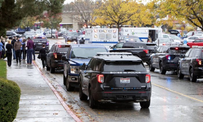Police and emergency crews respond to a reported shooting incident at Boise Towne Square, in Boise, Idaho, on Oct. 25, 2021. (Darin Oswald/Idaho Statesman via AP)