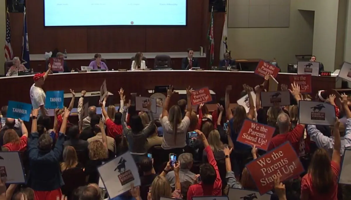 In this file image from video, a Loudoun County School Board meeting is taking place on June 22, 2021. (The Epoch Times via LCPS)