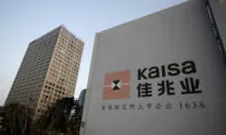 China Developers Hit by Downgrades as Evergrande Deadline Looms