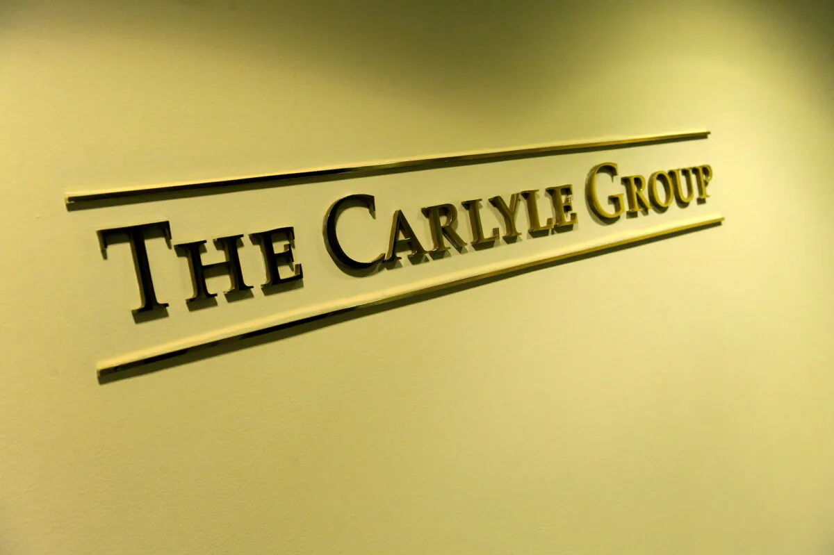 The Carlyle Group's logo is seen at the lobby outside the Carlyle Group offices in Washington on May 3, 2012. (Jonathan Ernst/Reuters)