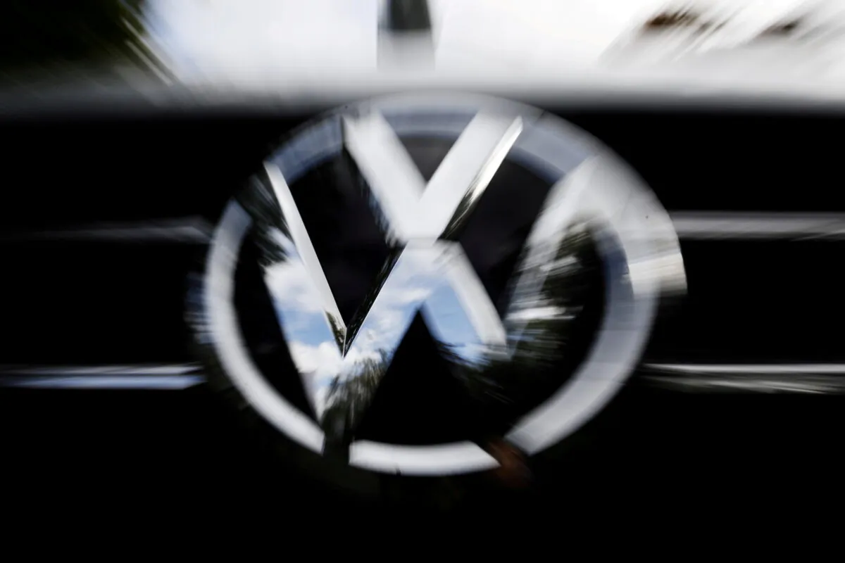 The VW logo is seen at the site of the first hearing of a consumer group's class action suit on behalf of Volkswagen owners against VW over the diesel emissions cheating scandal, at the Higher Regional Court in Braunschweig, Germany, on Sept. 30, 2019. (Michele Tantussi/Reuters)