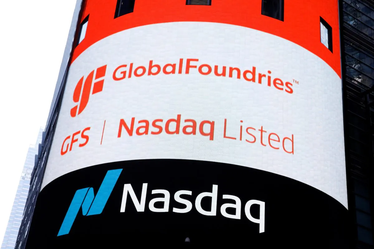 A screen displays the company logo for semiconductor and chipmaker GlobalFoundries Inc. during the company's IPO at the Nasdaq MarketSite in Times Square in New York City, U.S., Oct. 28, 2021.  (Brendan McDermid/Reuters)