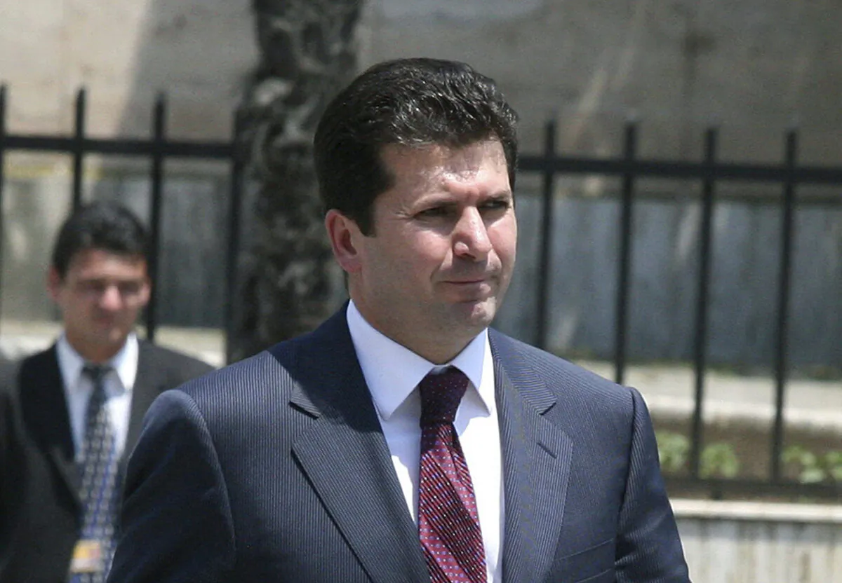 Albanian Defense Minister, Fatmir Mediu, walking in Tirana, Albania, in June 2007. (Hektor Pustina/AP Photo)
