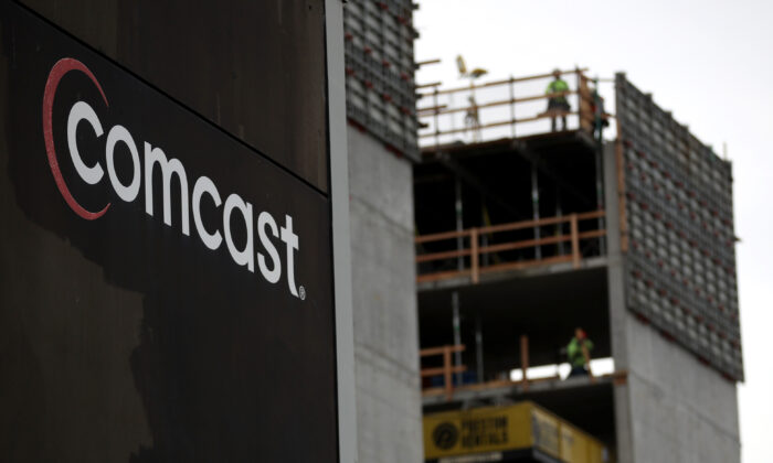 The Comcast logo is displayed connected  the exterior of a Comcast bureau   successful  San Francisco, Calif., connected  Jan. 23, 2020. (Justin Sullivan/Getty Images)