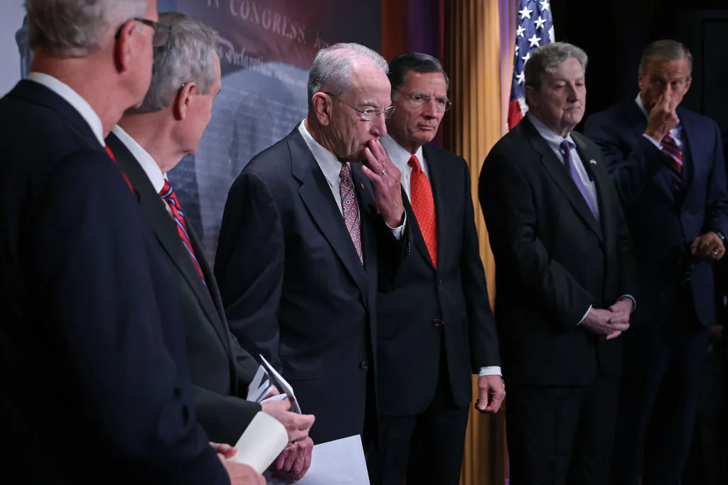 Republican senators, including (L-R) Sen. Jerry Moran (R-KS), Sen. Mike Crapo (R-ID), Sen. Charles Grassley (R-IA), Sen. John Barrasso (R-WY), Sen. John Kennedy (R-LA), and Sen. John Thune (R-SD) hold a news conference to talk about their opposition to proposed reforms to the Internal Revenue Service at the U.S. Capitol on Oct. 19, 2021. (Chip Somodevilla/Getty Images)