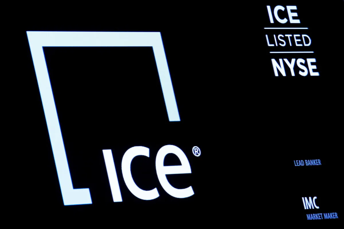 A screen displays the logo and ticker symbol for Intercontinental Exchange, Inc. on the floor of the New York Stock Exchange (NYSE) in New York City, U.S., on Nov. 3, 2016.  (Brendan McDermid/Reuters)
