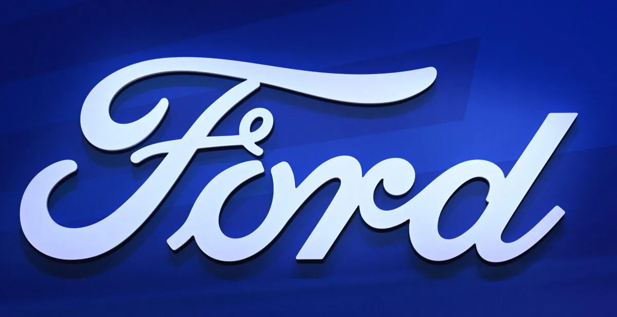The logo of U.S. carmaker Ford can be seen at the company's booth at the International Motor Show (IAA) Germany, in Munich, southern Germany, on Sept. 8, 2021. (Christof Stache/AFP via Getty Images)