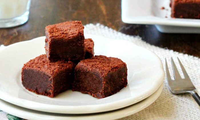  ratio of chocolate to flour in this recipe is wildly out of balance (chocolate wins), which yields a rich and dense brownie. (Lynda Balslev for Tastefood)