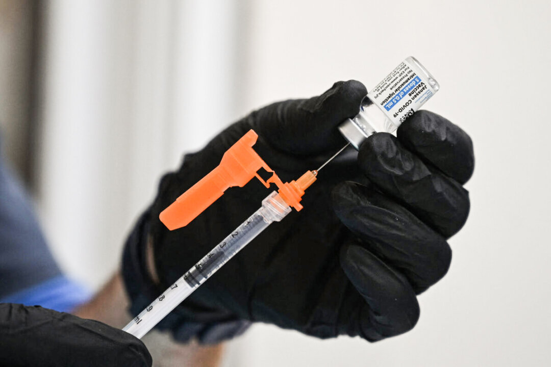 A nurse fills a syringe with Johnson & Johnson's in Pasadena, Calif., on Aug. 19, 2021. (Robyn Beck/AFP via Getty Images)