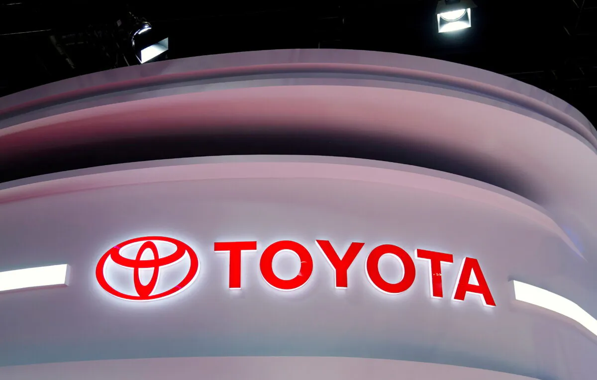 The Toyota logo is seen at a booth during a media day for the Auto Shanghai show in Shanghai, China, on April 19, 2021. (Aly Song/Reuters)