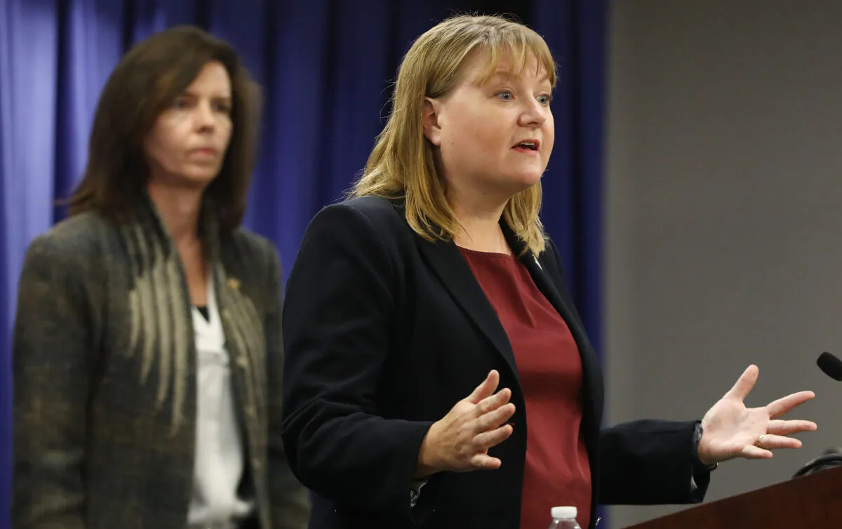 U.S. Attorney Tracy Wilkison (R) speaks in Los Angeles on Sept. 6, 2018. (Mario Tama/Getty Images)