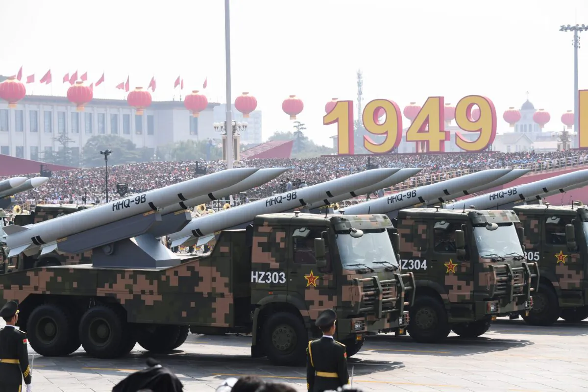 Military vehicles carrying HHQ-9B surface-to-air missiles participate in a military parade at Tiananmen Square in Beijing on Oct. 1, 2019. (Greg Baker/AFP via Getty Images)